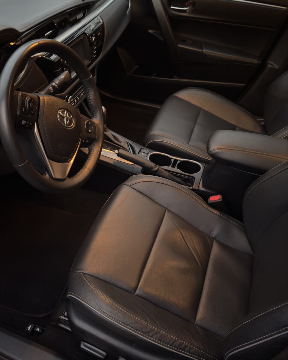 Toyota Corolla black leather interior after full detail