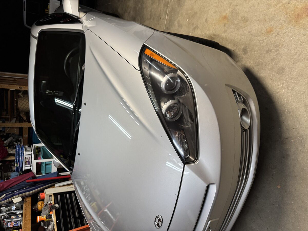 Crystal clear headlight after restoration by Perfect Touch Mobile Detailing in West Chester Ohio