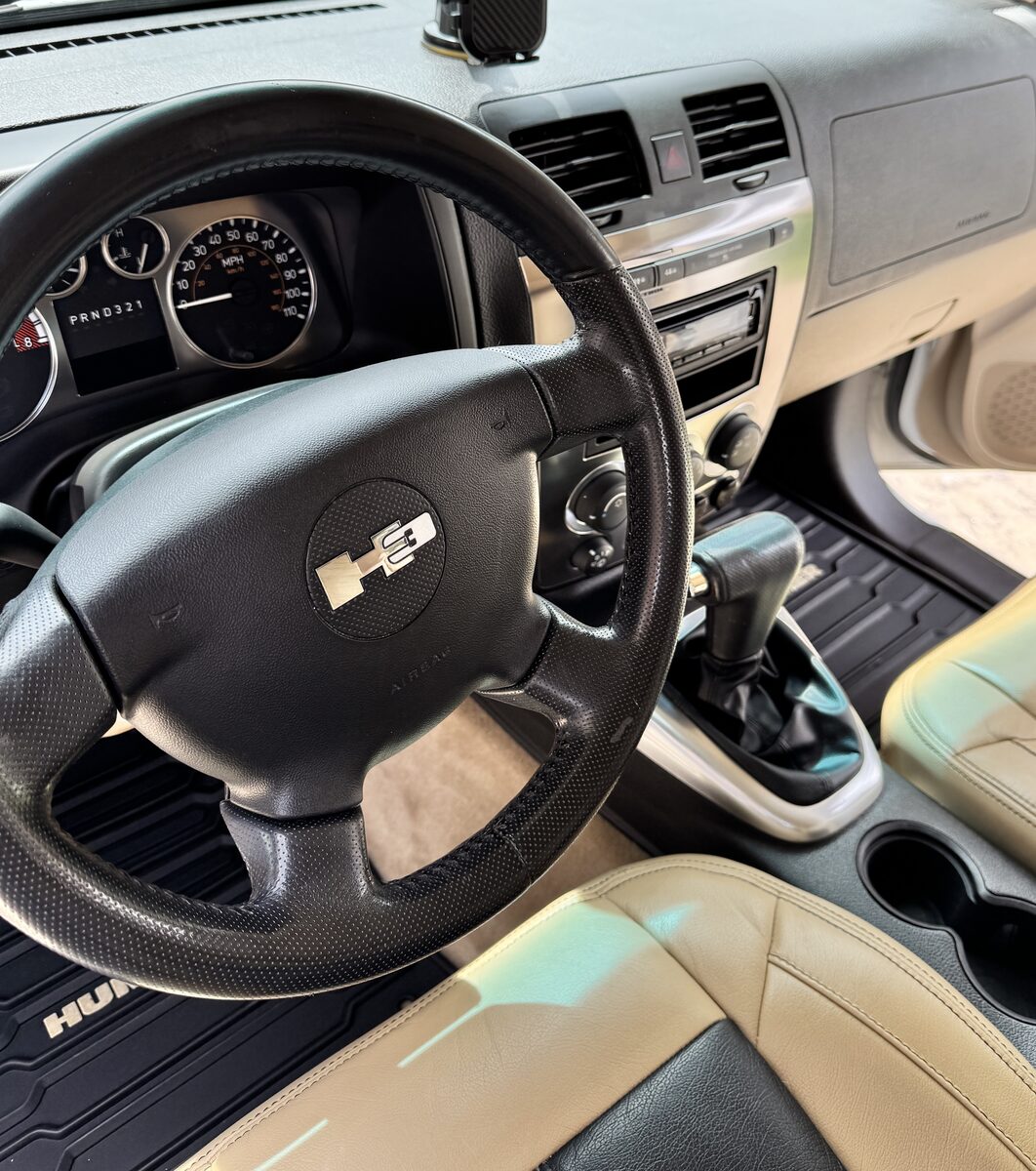Hummer H3 interior detailed with clean dashboard and leather