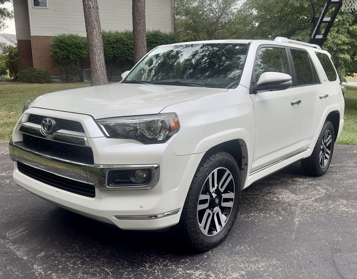 Freshly detailed white Toyota 4Runner in client driveway - Perfect Touch Mobile Detailing West Chester Ohio